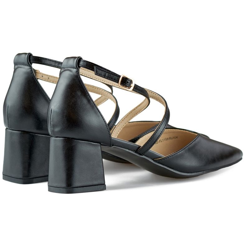 Black pumps with straps on a low heel 1