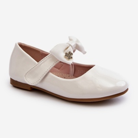 Children's patent white ballerina shoes with a Velcro bow 1