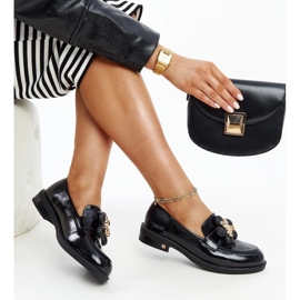 Black leather shoes with a decorative buckle 1