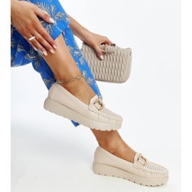 Beige leather shoes with a decorative buckle 1