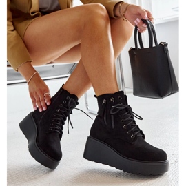 Black insulated suede wedge boots by Safiya 1