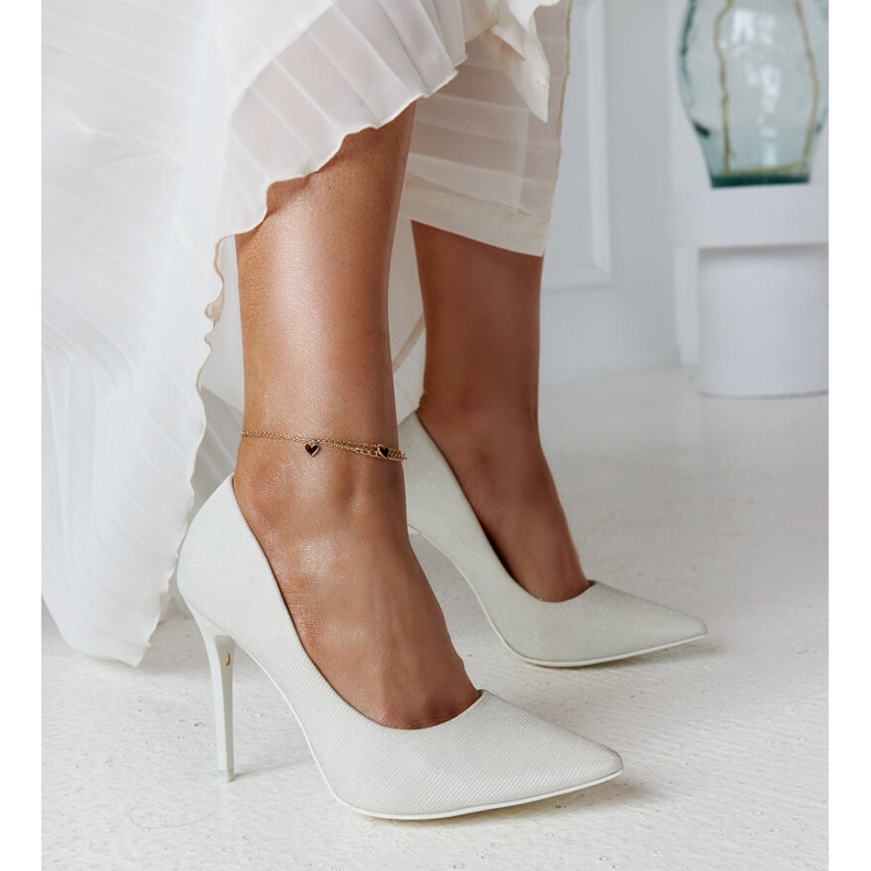 White shiny high heels with a leather insert by Cortesa 1