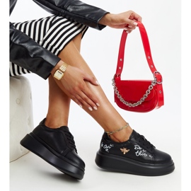 Black leather shoes with a decorative buckle 1