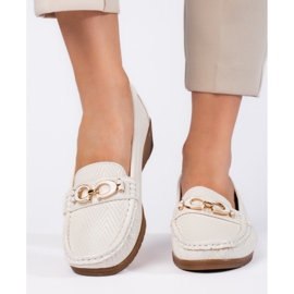 White women's moccasins with a low wedge 1