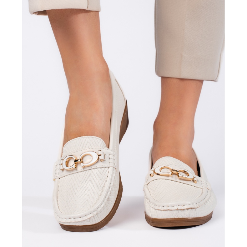White women's moccasins with a low wedge 1