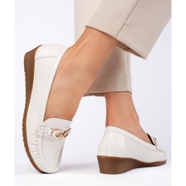 White women's moccasins with a low wedge 2
