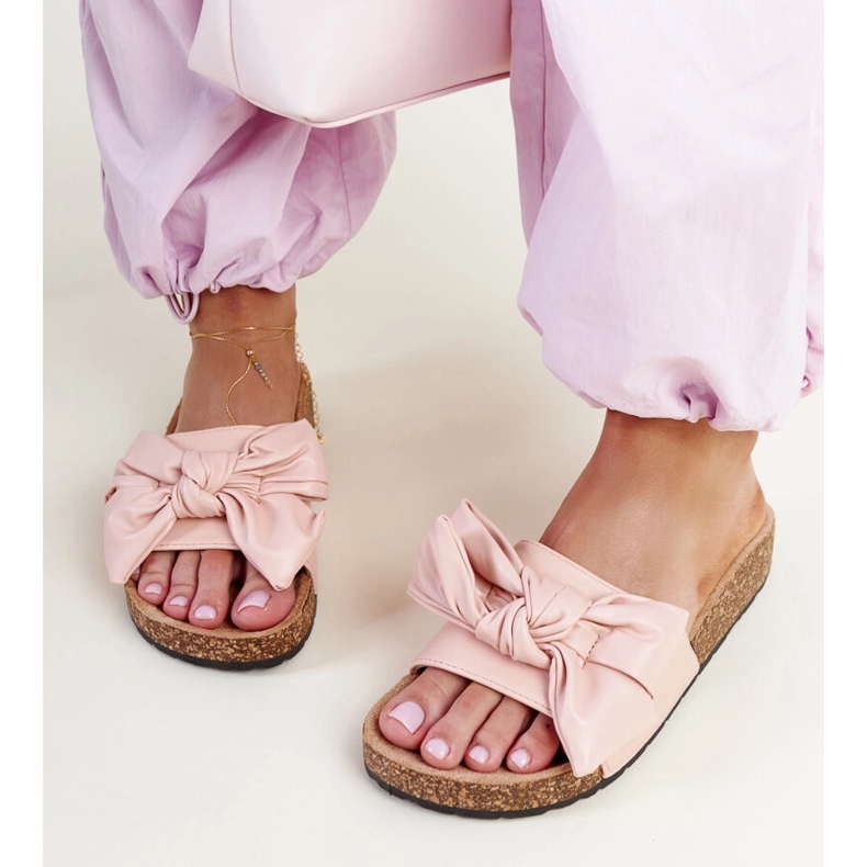 Pink flip-flops with a cork sole and a Petresa bow 2