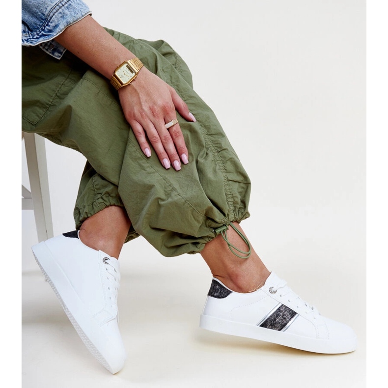 White and black sneakers with a decorative Grada stripe 1 White and black sneakers with a decorative Grada stripe 1