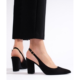 Black pumps with an open heel 2