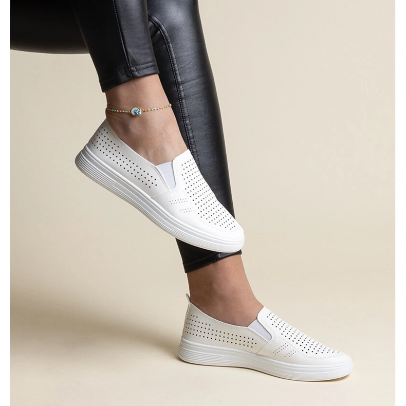 White openwork slip-on sneakers by Dafina 1