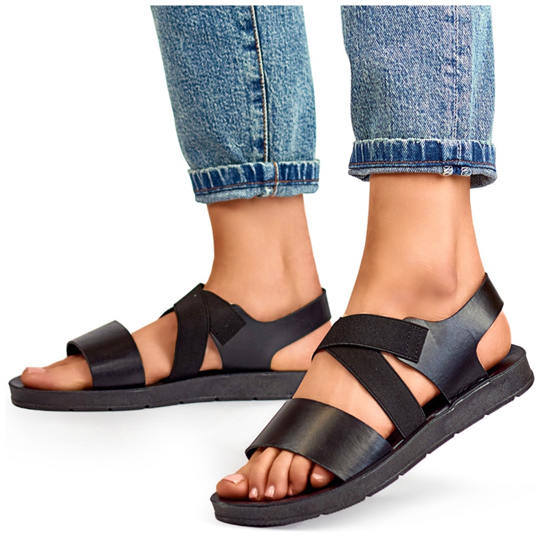 Black elastic sandals with a fitted upper and elastic band 2