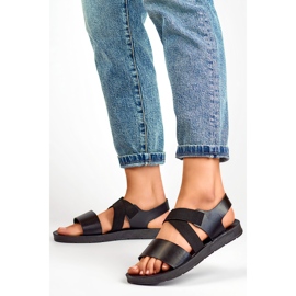 Black elastic sandals with a fitted upper and elastic band 1
