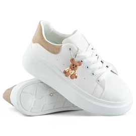 White sports shoes with a thick sole and a beige teddy bear 1