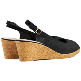 Ladies' black sandals on a low wedge 1