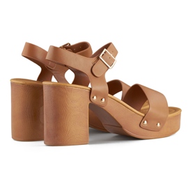 Brown sandals with a wooden platform heel 1