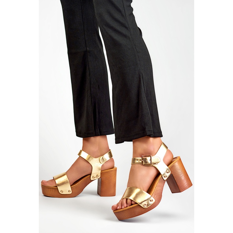 Gold sandals with a wooden platform heel golden 2
