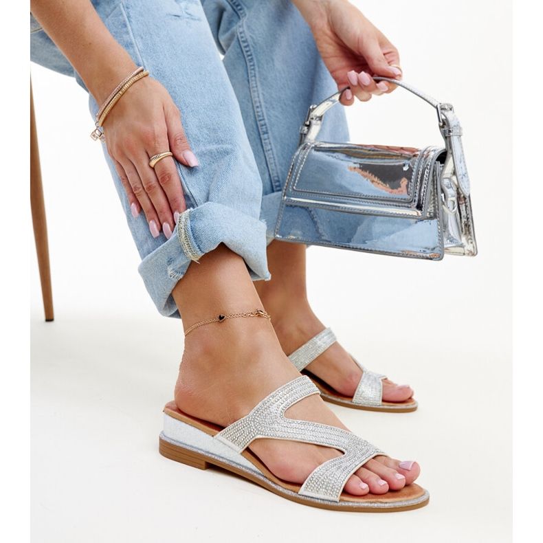 Silver flip-flops with a low wedge from Asker 1