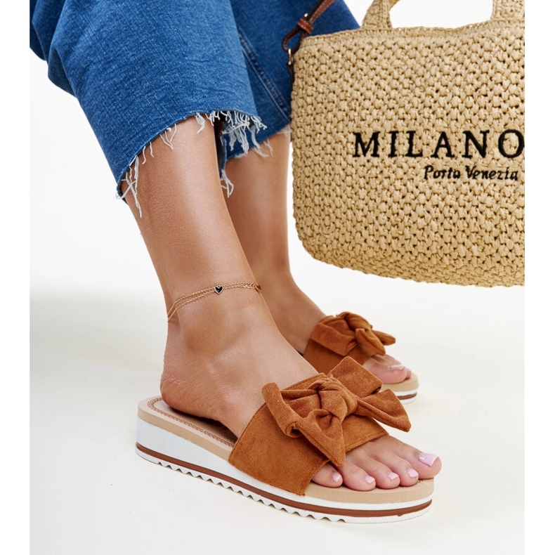 Mikhaila's brown low-heeled mules 1