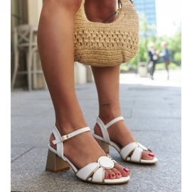 White high-heeled sandals with a leather insert by Saiha 2