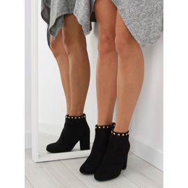 Black high-heeled boots with black studs 2