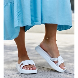 Ferrei white rubber flip-flops 2