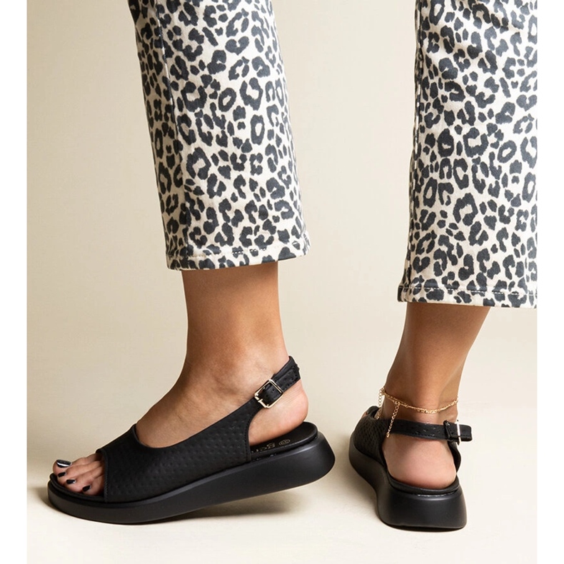 Black sandals with a thick Hamond sole 1 Black sandals with a thick Hamond sole 1