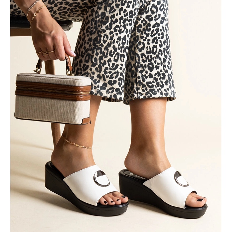 White wedge mules with a Keirenh buckle 1 White wedge mules with a Keirenh buckle 1