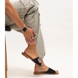 Black flip flops with Almeita buckle 1