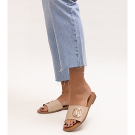 Beige buckle slides by Almeita 1