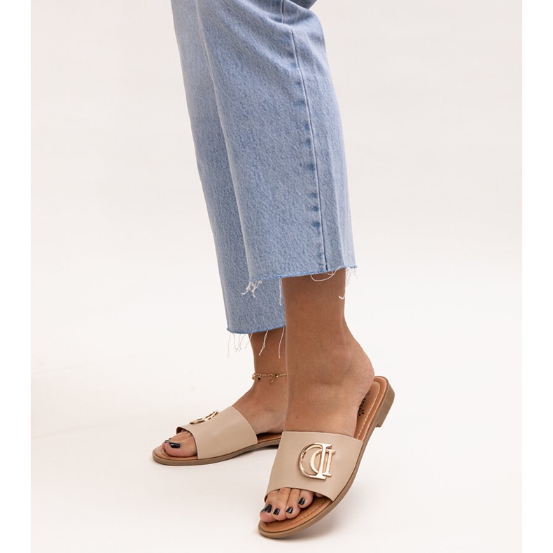 Beige buckle slides by Almeita 1