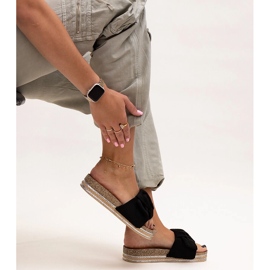 Black flip-flops with a massive Peletra sole 1