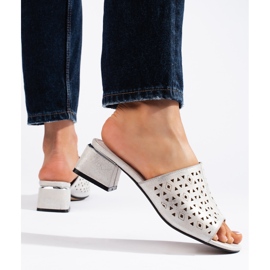 Openwork silver flip-flops with a low heel 1