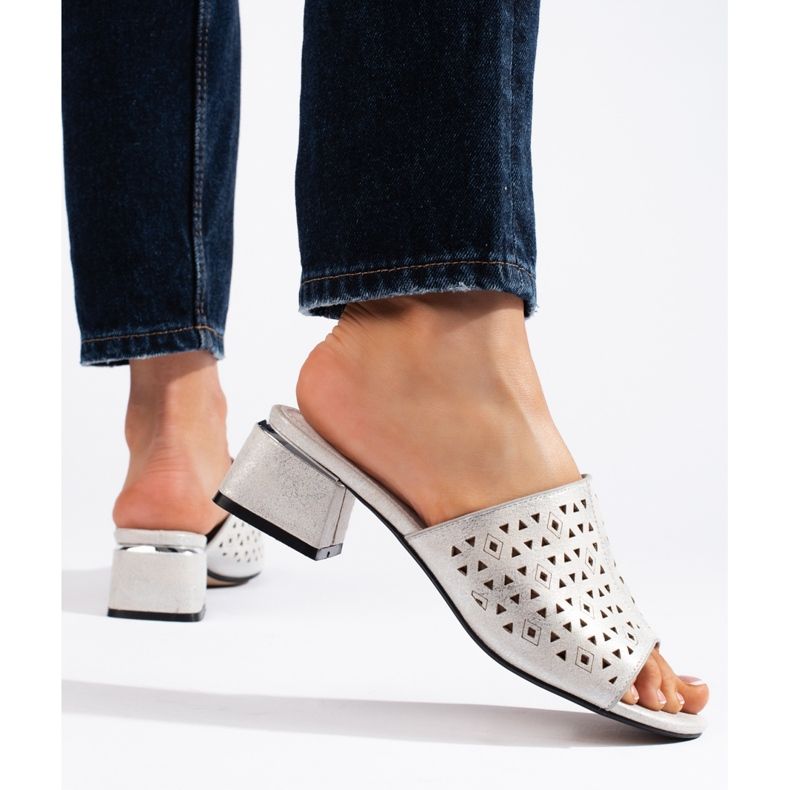 Openwork silver flip-flops with a low heel 1