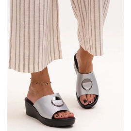 Silver wedge mules with a Keirenh buckle 1