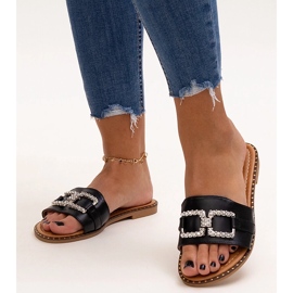 Black flip-flops with a decorative buckle by Rochaela 1 Black flip-flops with a decorative buckle by Rochaela 1