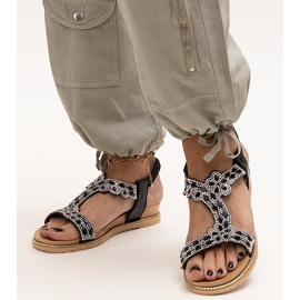 Shahida's shiny black sandals 1