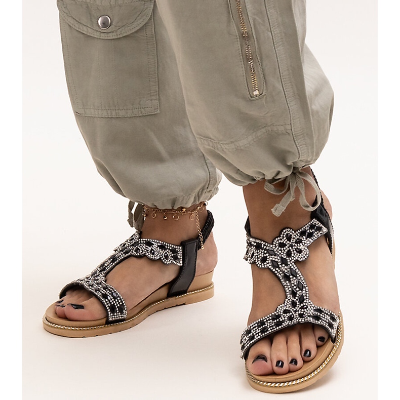 Shahida's shiny black sandals 1