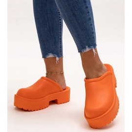 Orange flip-flops with a massive Huss sole 1