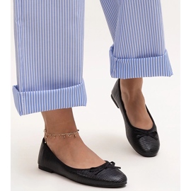 Black ballet flats with a bow and a leather insert by Rosaly 1