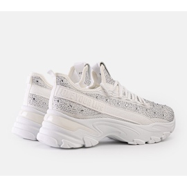 White shiny sneakers with a massive Senai sole 1