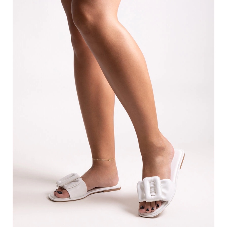 White slippers with a Ganema buckle 1