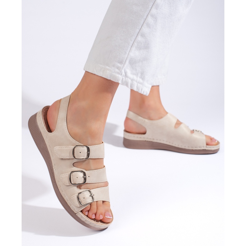 Women's beige sandals with a low wedge 1 Women's beige sandals with a low wedge 1