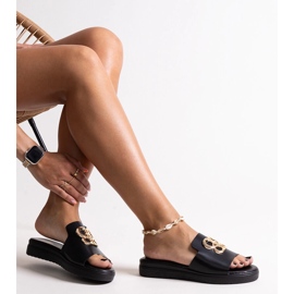 Black flip-flops with a decorative Jinan buckle 1 Black flip-flops with a decorative Jinan buckle 1