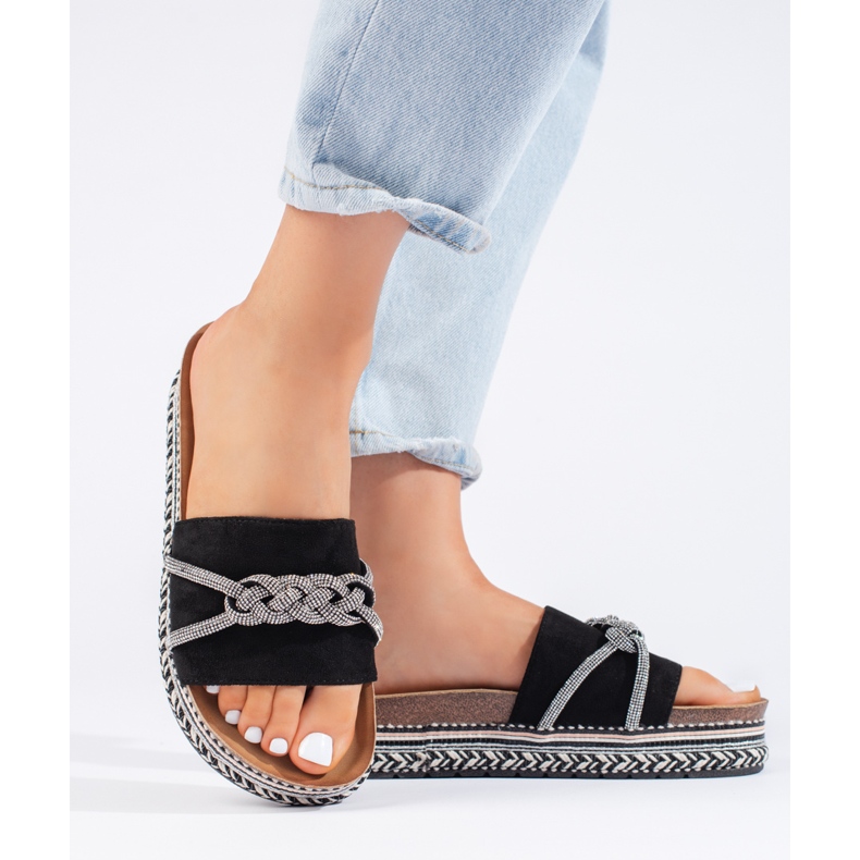 Black slippers on the platform 2