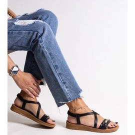 Black sandals with a gold buckle by Pamphila 1 Black sandals with a gold buckle by Pamphila 1