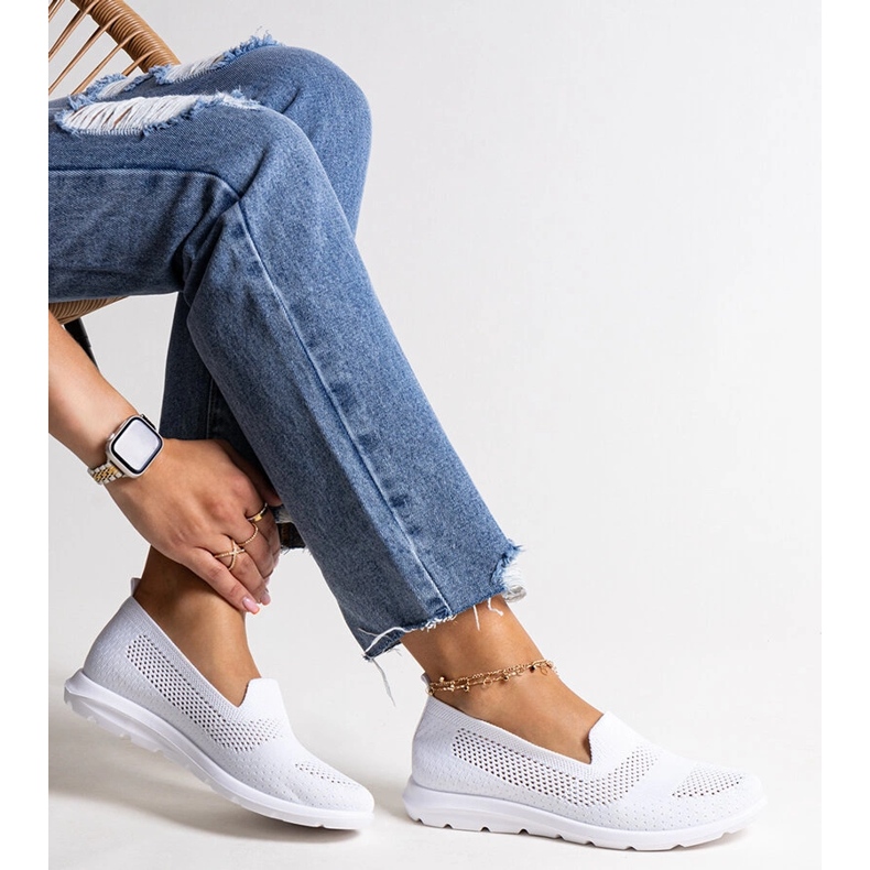 Rahim's white sneakers with a foam sole 1