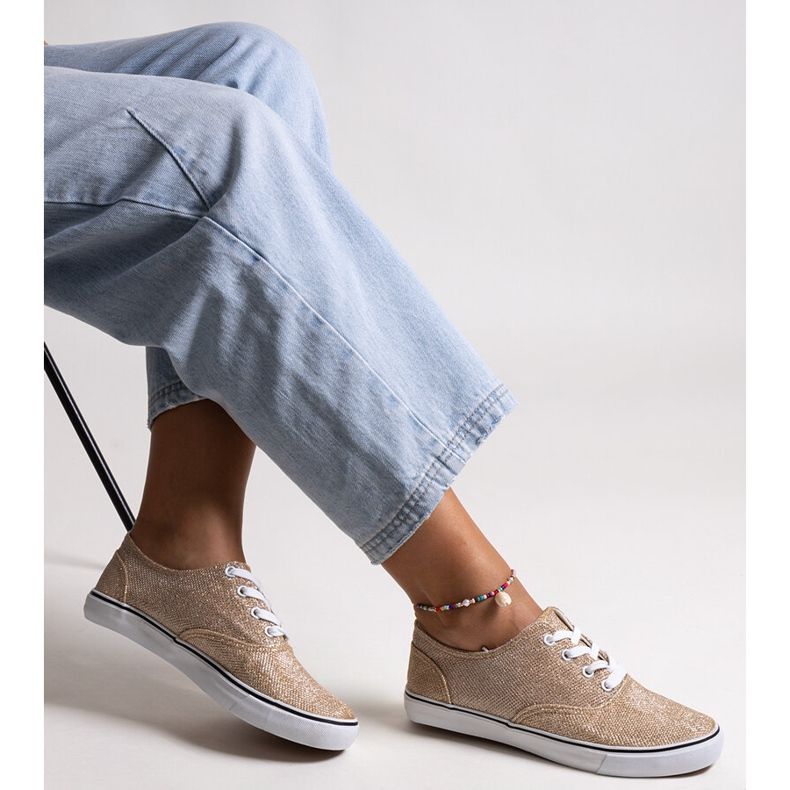 Gold shiny Carroline sneakers golden 1
