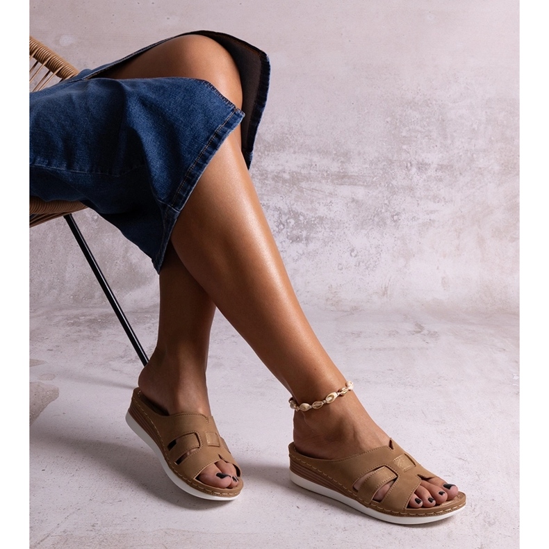 Brown lightweight low-heeled flip-flops by Mifsuda 1