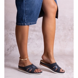 Navy blue lightweight flip-flops with a low wedge from Mifsuda 1