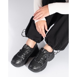 Black sneakers with a thick sole 1